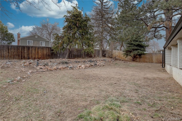 view of yard featuring a fenced backyard