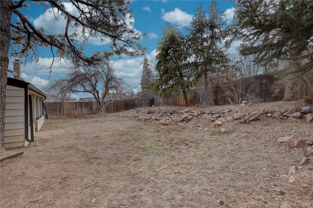 view of yard with fence