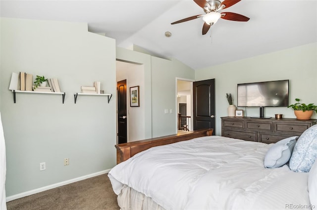 bedroom featuring lofted ceiling, ceiling fan, and carpet