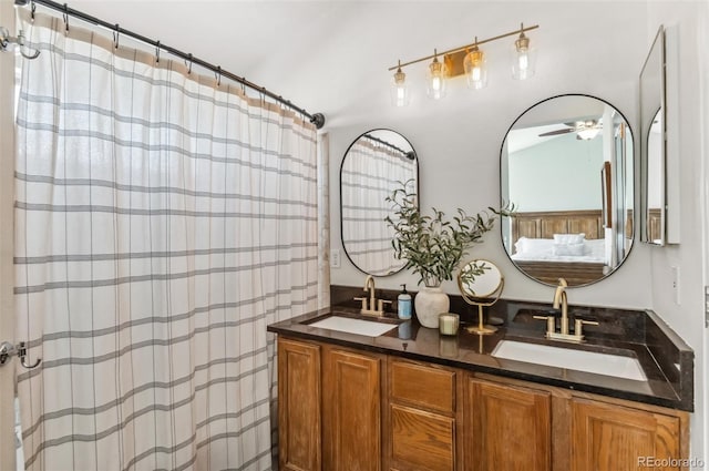 bathroom with vanity and ceiling fan