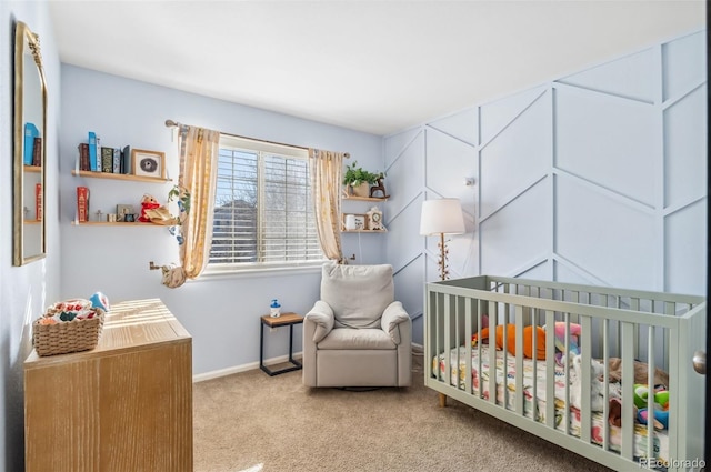 bedroom featuring a nursery area and light colored carpet