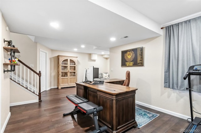 office space with dark hardwood / wood-style flooring