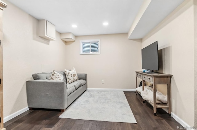 living room with dark hardwood / wood-style floors