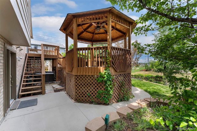 11335 W 54th Ln, Arvada, CO 80002 - view of patio with stairs, a gazebo, and a wooden deck