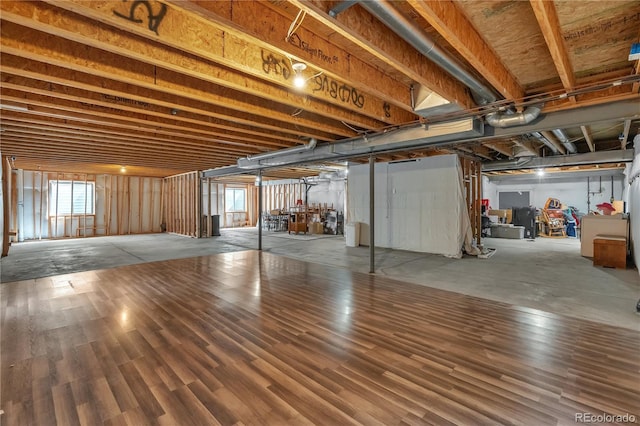 below grade area featuring wood finished floors