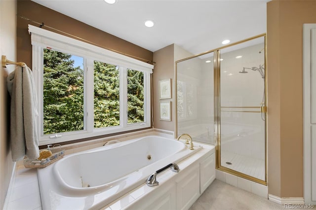 bathroom featuring plus walk in shower