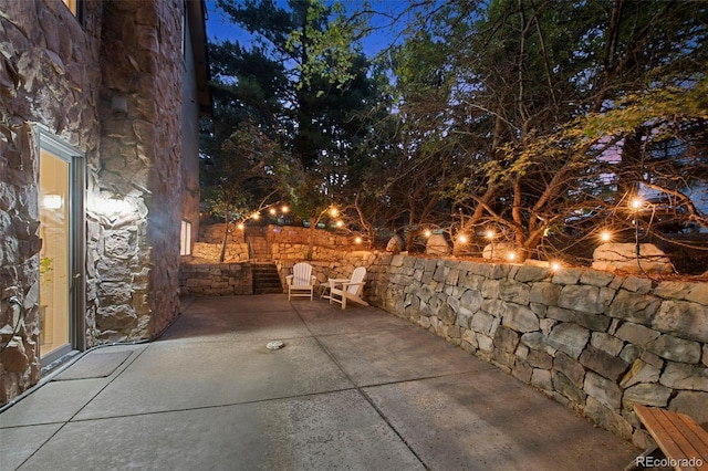 view of patio at twilight