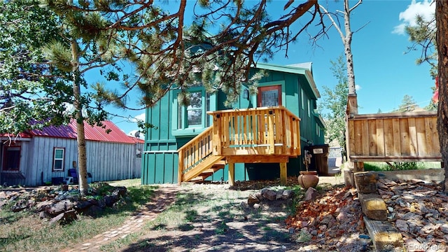 view of front of home with a deck