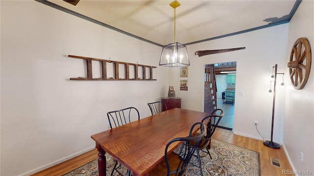 dining area featuring hardwood / wood-style flooring