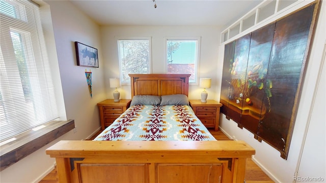 bedroom featuring light wood-type flooring