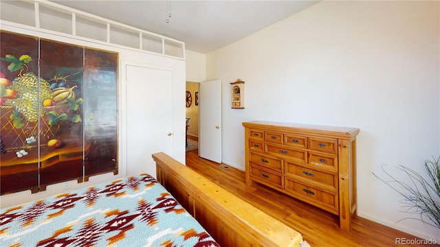 bedroom featuring hardwood / wood-style flooring