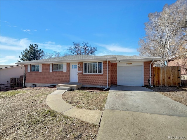 single story home with a garage