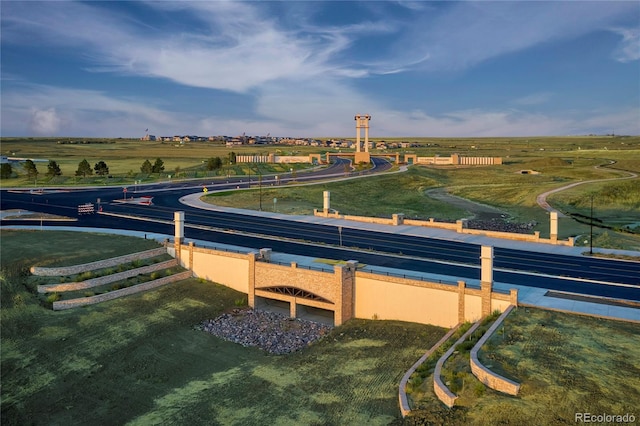 birds eye view of property featuring a rural view