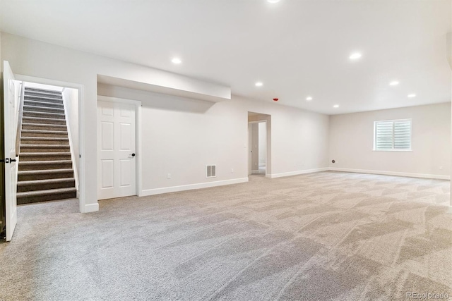 basement with light carpet