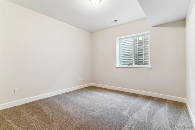 view of carpeted spare room