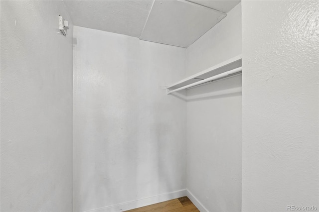3663 S Sheridan Blvd Unit L6, Denver, CO 80235 - spacious closet with wood finished floors