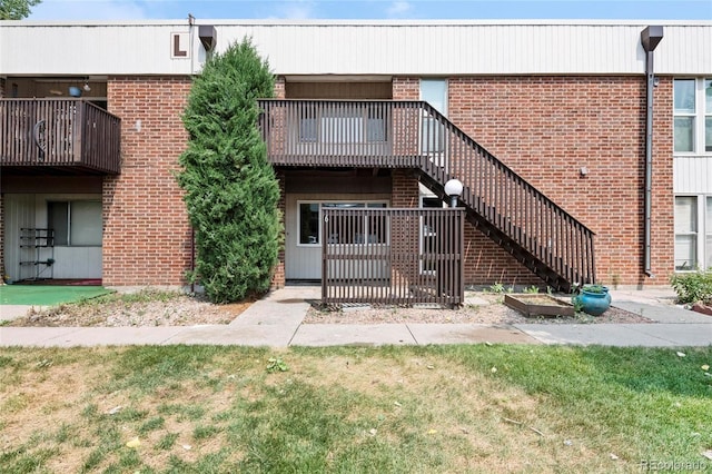 3663 S Sheridan Blvd Unit L6, Denver, CO 80235 - view of property featuring stairway