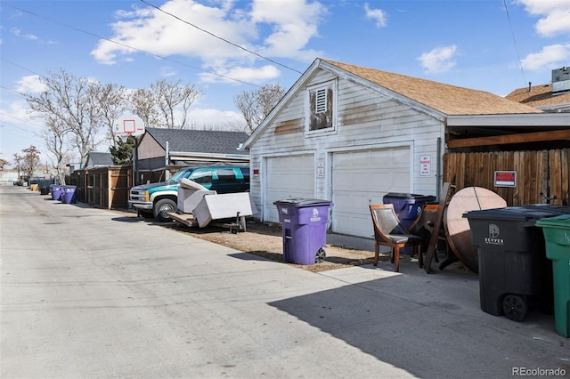 4445 Pearl St, Denver, CO 80216 - garage featuring a garage