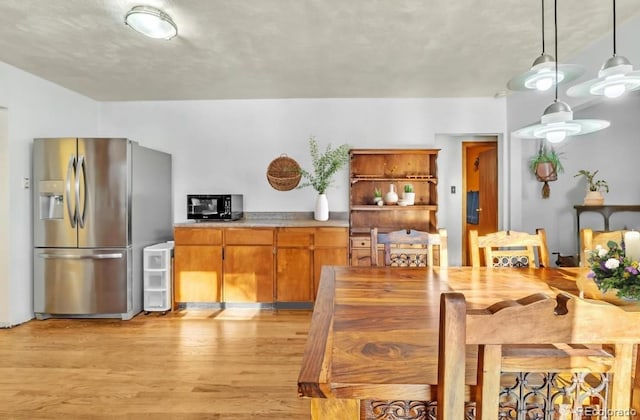 dining area featuring light hardwood / wood-style floors