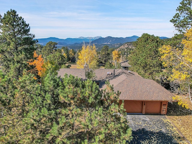 birds eye view of property featuring a mountain view