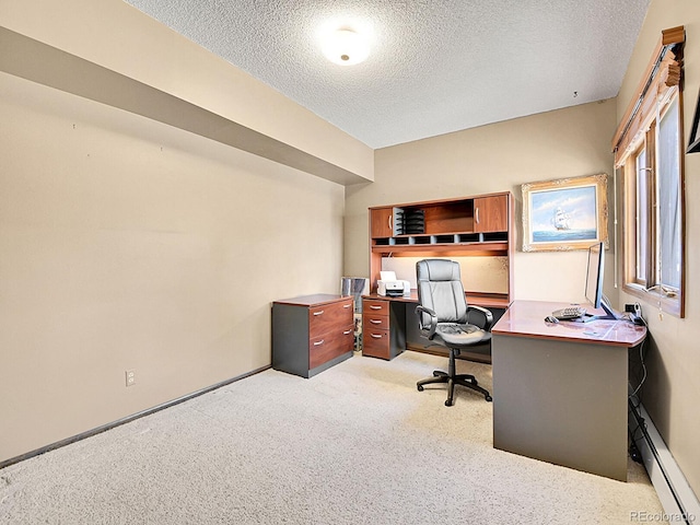 carpeted office space with a baseboard radiator and a textured ceiling