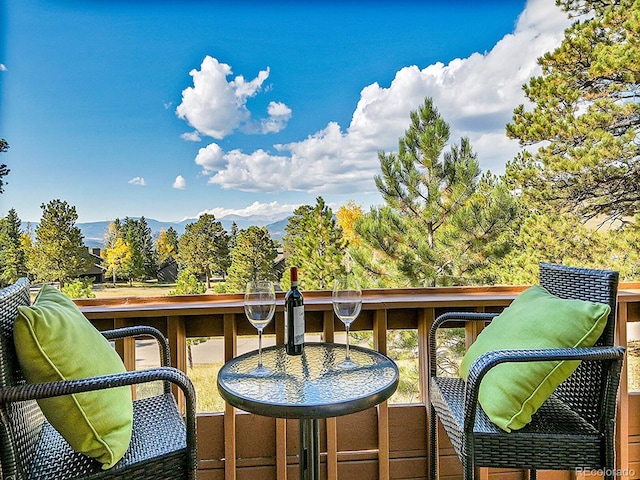 balcony featuring a mountain view