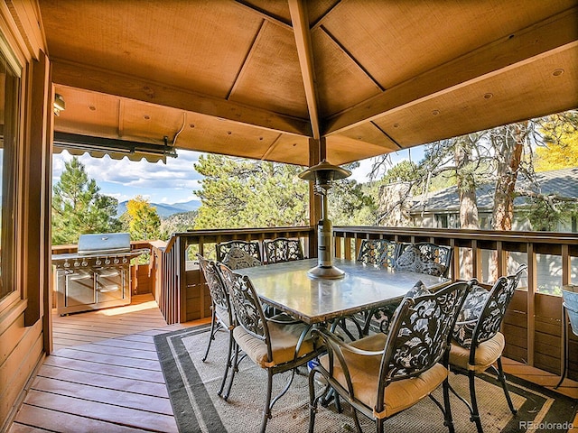 deck with a gazebo and grilling area