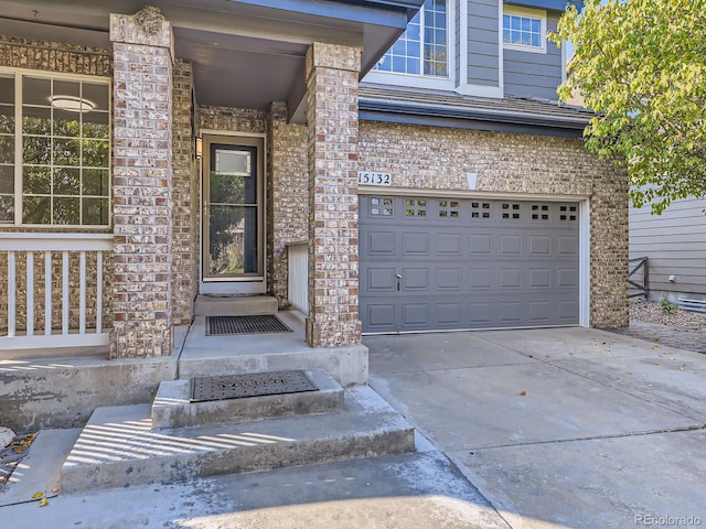 property entrance with a garage