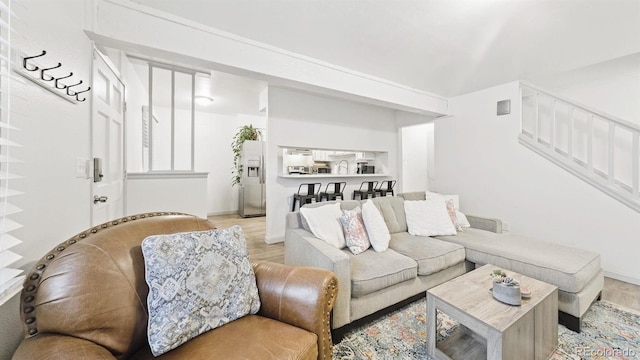 677 Vrain St Unit 15, Denver, CO 80204 - living area with wood finished floors and stairs
