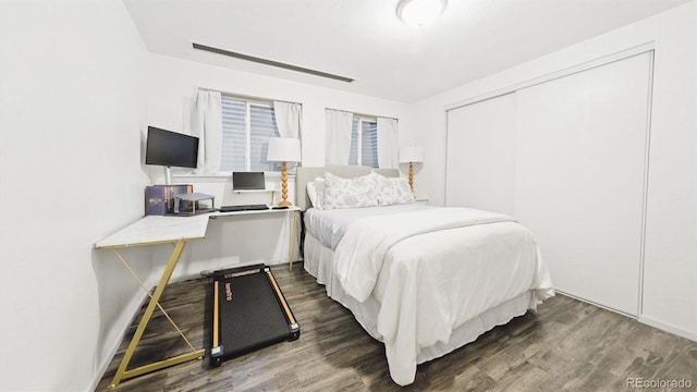 677 Vrain St Unit 15, Denver, CO 80204 - bedroom featuring wood finished floors and a closet