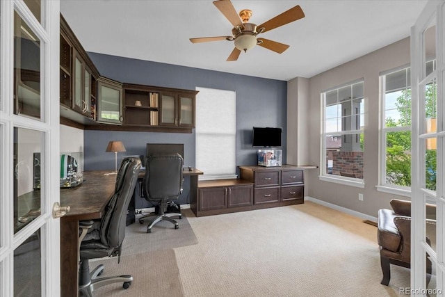 10683 Amesbury Way, Highlands Ranch, CO 80126 - office area with light carpet and a ceiling fan