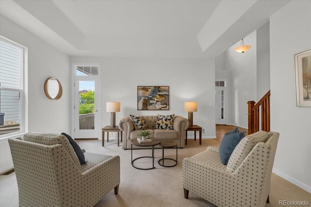 10683 Amesbury Way, Highlands Ranch, CO 80126 - carpeted living room with baseboards and stairs