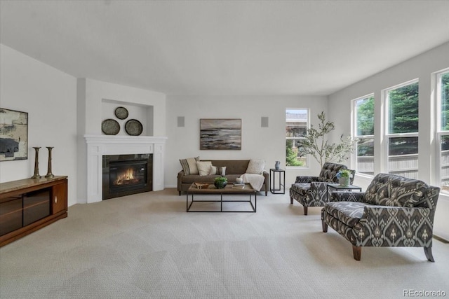 10683 Amesbury Way, Highlands Ranch, CO 80126 - carpeted living area featuring a glass covered fireplace