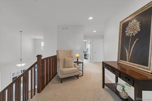 10683 Amesbury Way, Highlands Ranch, CO 80126 - living area with light carpet, an upstairs landing, and recessed lighting