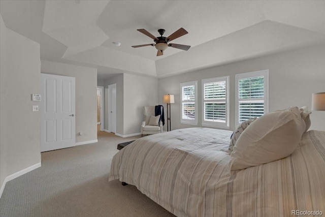 10683 Amesbury Way, Highlands Ranch, CO 80126 - bedroom featuring a raised ceiling, light colored carpet, and ceiling fan
