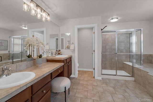 10683 Amesbury Way, Highlands Ranch, CO 80126 - bathroom featuring double vanity and a stall shower