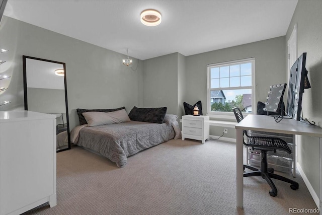 10683 Amesbury Way, Highlands Ranch, CO 80126 - carpeted bedroom with a desk and a chandelier