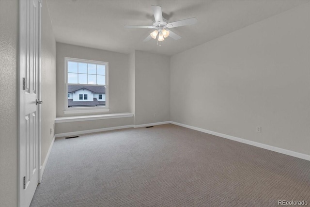10683 Amesbury Way, Highlands Ranch, CO 80126 - carpeted spare room featuring a ceiling fan and baseboards