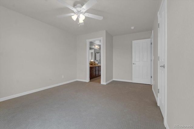 10683 Amesbury Way, Highlands Ranch, CO 80126 - unfurnished bedroom featuring carpet floors, ensuite bath, and a ceiling fan
