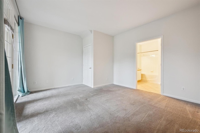 2824 W Centennial Dr Unit L, Littleton, CO 80123 - unfurnished bedroom featuring carpet flooring, baseboards, and ensuite bath