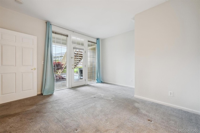 2824 W Centennial Dr Unit L, Littleton, CO 80123 - carpeted empty room with baseboards