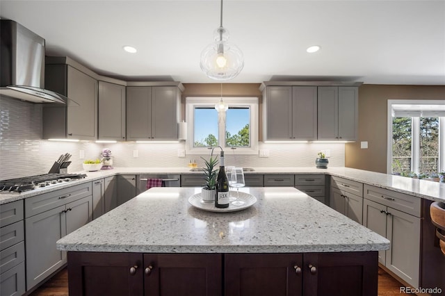 5 Sanford Rd, Colorado Springs, CO 80906 - kitchen with appliances with stainless steel finishes, gray cabinetry, wall chimney exhaust hood, recessed lighting, and tasteful backsplash