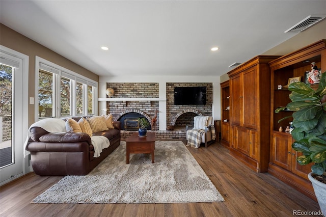 5 Sanford Rd, Colorado Springs, CO 80906 - living room featuring a fireplace, dark wood-style floors, and recessed lighting