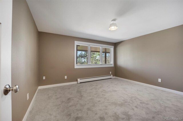 5 Sanford Rd, Colorado Springs, CO 80906 - carpeted empty room featuring baseboard heating and baseboards