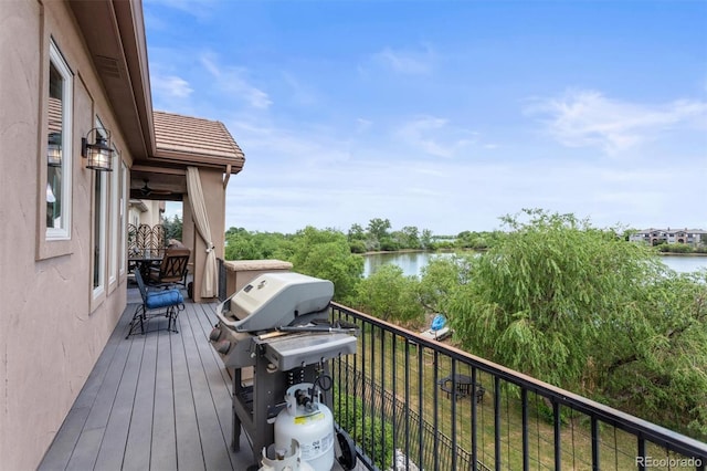 8070 W Progress Cir, Littleton, CO 80123 - wooden deck with a water view and a grill