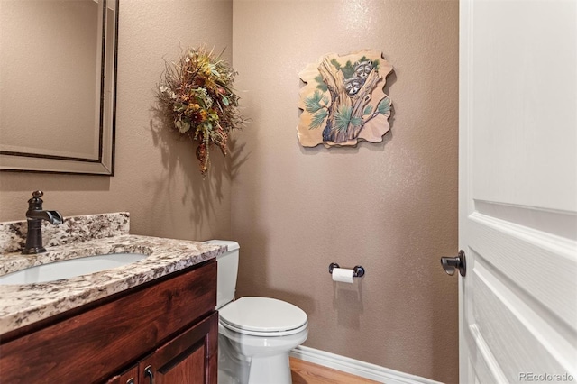 8070 W Progress Cir, Littleton, CO 80123 - bathroom with vanity and wood finished floors