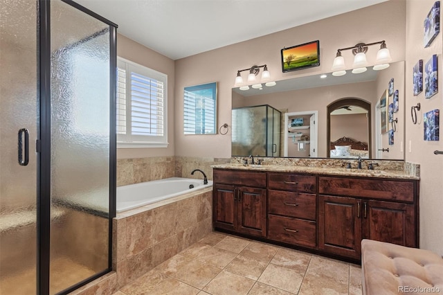 8070 W Progress Cir, Littleton, CO 80123 - bathroom with a stall shower, a garden tub, double vanity, tile patterned floors, and ensuite bathroom