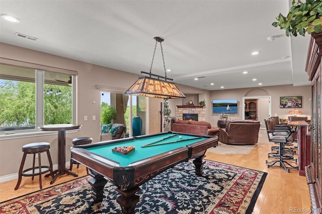 8070 W Progress Cir, Littleton, CO 80123 - rec room with a stone fireplace, recessed lighting, pool table, and light wood-style floors