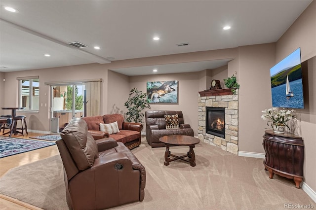 8070 W Progress Cir, Littleton, CO 80123 - living room with recessed lighting and a stone fireplace
