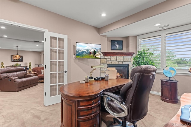 8070 W Progress Cir, Littleton, CO 80123 - office space with light carpet, french doors, recessed lighting, and a stone fireplace